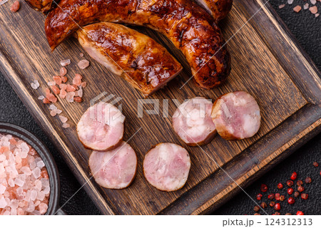 Delicious sausage with salt, spices and herbs Delicious sausage with salt, spices and herbs 124312313