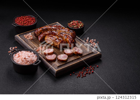 Delicious sausage with salt, spices and herbs Delicious sausage with salt, spices and herbs 124312315