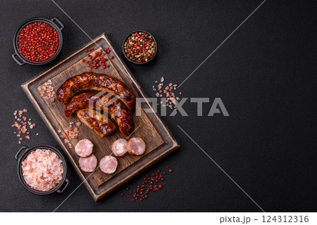 Delicious sausage with salt, spices and herbs Delicious sausage with salt, spices and herbs 124312316