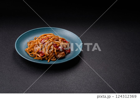 Delicious Asian food udon with noodles, chicken, hot pepper, vegetables Delicious Asian food udon with noodles, chicken, hot pepper, vegetables 124312369
