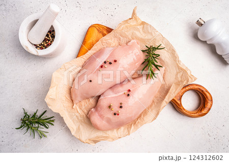 Raw chicken fillet or breasts 124312602