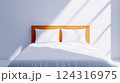 Sunlight illuminating minimalist bedroom with bed and pillows 124316975