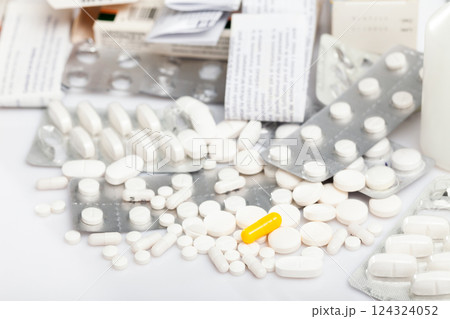 Tablets and capsules pills on white background Tablets and capsules pills on white background 124324052