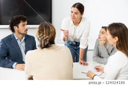 College students in study group preparing for test together 124324180