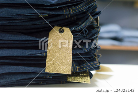 Close up of blue jeans on others with copy space, Various jeans on others with space for text, Clothes sale concept 124328142