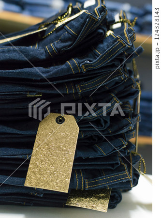 Close up of blue jeans on others with copy space, Various jeans on others with space for text, Clothes sale concept 124328143