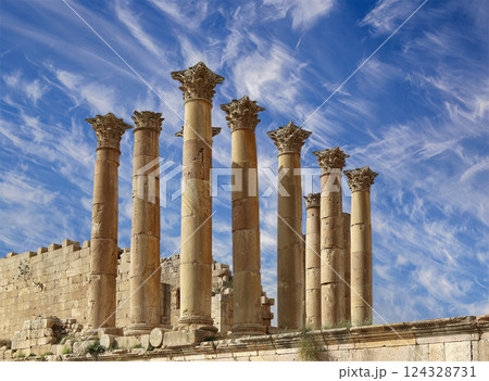 Temple of Zeus, Jordanian city of Jerash (Gerasa of Antiquity), capital and largest city of Jerash Governorate, Jordan. Against the background of a beautiful sky with clouds Temple of Zeus, Jordanian city of Jerash (Gerasa of Antiquity), capital and largest city of Jerash Governorate, Jordan. Against the background of a beautiful sky with clouds 124328731