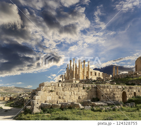 Temple of Zeus, Jordanian city of Jerash (Gerasa of Antiquity), capital and largest city of Jerash Governorate, Jordan. Against the background of a beautiful sky with clouds Temple of Zeus, Jordanian city of Jerash (Gerasa of Antiquity), capital and largest city of Jerash Governorate, Jordan. Against the background of a beautiful sky with clouds 124328755