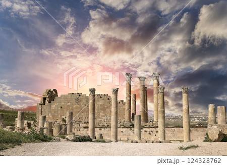 Temple of Zeus, Jordanian city of Jerash (Gerasa of Antiquity), capital and largest city of Jerash Governorate, Jordan. Against the background of a beautiful sky with clouds Temple of Zeus, Jordanian city of Jerash (Gerasa of Antiquity), capital and largest city of Jerash Governorate, Jordan. Against the background of a beautiful sky with clouds 124328762