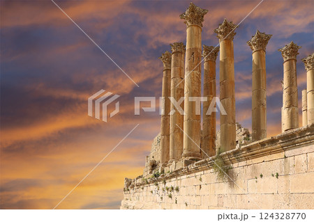 Temple of Zeus, Jordanian city of Jerash (Gerasa of Antiquity), capital and largest city of Jerash Governorate, Jordan. Against the background of a beautiful sky with clouds Temple of Zeus, Jordanian city of Jerash (Gerasa of Antiquity), capital and largest city of Jerash Governorate, Jordan. Against the background of a beautiful sky with clouds 124328770