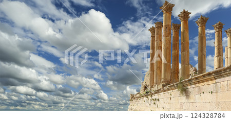 Temple of Zeus, Jordanian city of Jerash (Gerasa of Antiquity), capital and largest city of Jerash Governorate, Jordan. Against the background of a beautiful sky with clouds Temple of Zeus, Jordanian city of Jerash (Gerasa of Antiquity), capital and largest city of Jerash Governorate, Jordan. Against the background of a beautiful sky with clouds 124328784