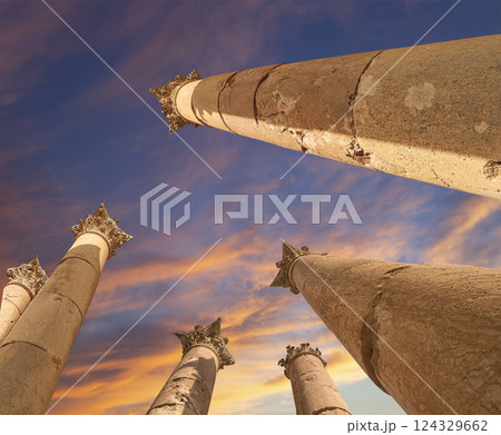 Roman Columns in the Jordanian city of Jerash (Gerasa of Antiquity), capital and largest city of Jerash Governorate, Jordan. Against the background of a beautiful sky with clouds 124329662