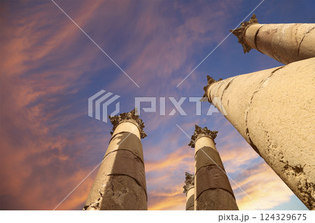 Roman Columns in the Jordanian city of Jerash (Gerasa of Antiquity), capital and largest city of Jerash Governorate, Jordan. Against the background of a beautiful sky with clouds Roman Columns in the Jordanian city of Jerash (Gerasa of Antiquity), capital and largest city of Jerash Governorate, Jordan. Against the background of a beautiful sky with clouds 124329675
