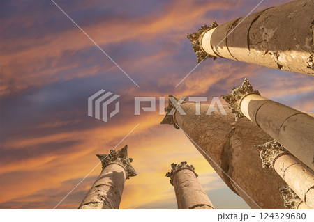 Roman Columns in the Jordanian city of Jerash (Gerasa of Antiquity), capital and largest city of Jerash Governorate, Jordan. Against the background of a beautiful sky with clouds 124329680