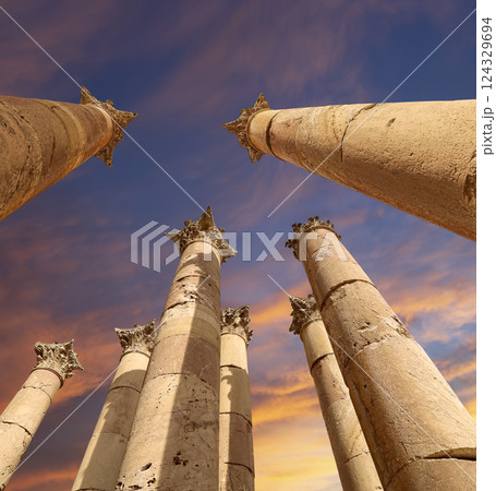 Roman Columns in the Jordanian city of Jerash (Gerasa of Antiquity), capital and largest city of Jerash Governorate, Jordan. Against the background of a beautiful sky with clouds Roman Columns in the Jordanian city of Jerash (Gerasa of Antiquity), capital and largest city of Jerash Governorate, Jordan. Against the background of a beautiful sky with clouds 124329694