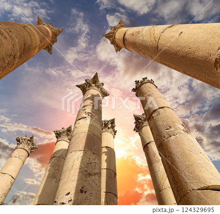 Roman Columns in the Jordanian city of Jerash (Gerasa of Antiquity), capital and largest city of Jerash Governorate, Jordan. Against the background of a beautiful sky with clouds Roman Columns in the Jordanian city of Jerash (Gerasa of Antiquity), capital and largest city of Jerash Governorate, Jordan. Against the background of a beautiful sky with clouds 124329695