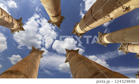 Roman Columns in the Jordanian city of Jerash (Gerasa of Antiquity), capital and largest city of Jerash Governorate, Jordan. Against the background of a beautiful sky with clouds 124329698