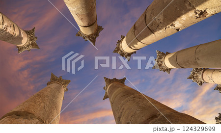 Roman Columns in the Jordanian city of Jerash (Gerasa of Antiquity), capital and largest city of Jerash Governorate, Jordan. Against the background of a beautiful sky with clouds Roman Columns in the Jordanian city of Jerash (Gerasa of Antiquity), capital and largest city of Jerash Governorate, Jordan. Against the background of a beautiful sky with clouds 124329699