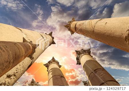 Roman Columns in the Jordanian city of Jerash (Gerasa of Antiquity), capital and largest city of Jerash Governorate, Jordan. Against the background of a beautiful sky with clouds Roman Columns in the Jordanian city of Jerash (Gerasa of Antiquity), capital and largest city of Jerash Governorate, Jordan. Against the background of a beautiful sky with clouds 124329717