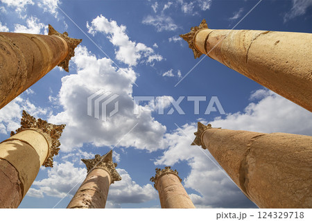 Roman Columns in the Jordanian city of Jerash (Gerasa of Antiquity), capital and largest city of Jerash Governorate, Jordan. Against the background of a beautiful sky with clouds 124329718