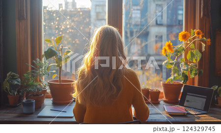 Stylish workspace with sunlight streaming through windows and plants. Generative AI Stylish workspace with sunlight streaming through windows and plants. Generative AI 124329745