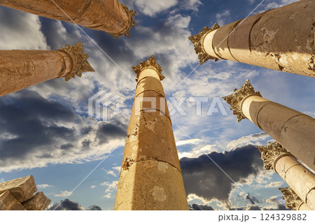 Roman Columns in the Jordanian city of Jerash (Gerasa of Antiquity), capital and largest city of Jerash Governorate, Jordan. Against the background of a beautiful sky with clouds 124329882