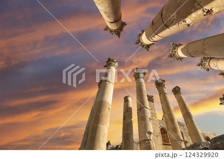 Roman Columns in the Jordanian city of Jerash (Gerasa of Antiquity), capital and largest city of Jerash Governorate, Jordan. Against the background of a beautiful sky with clouds Roman Columns in the Jordanian city of Jerash (Gerasa of Antiquity), capital and largest city of Jerash Governorate, Jordan. Against the background of a beautiful sky with clouds 124329920