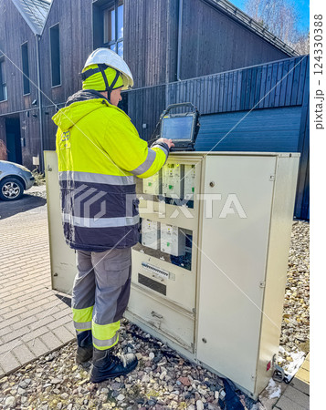 Male electrician worker checking operation electric system . High quality photo 124330388