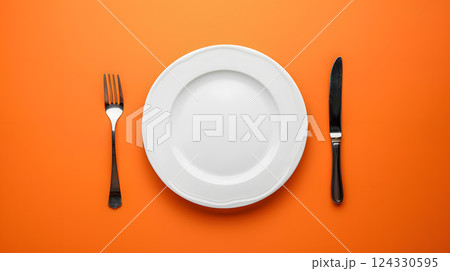 Cutlery, fork, knife, spoon and empty plate on a colored background. AI Generated 124330595