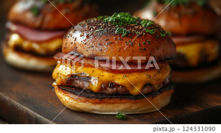 Gourmet mini burgers with melted cheddar cheese, crispy bacon, and toasted buns with herbs create an irresistible culinary experience Gourmet mini burgers with melted cheddar cheese, crispy bacon, and toasted buns with herbs create an irresistible culinary experience 124331090