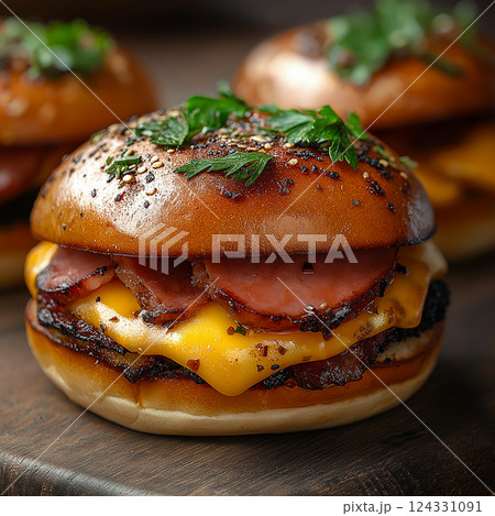 Gourmet mini burgers with melted cheddar cheese, crispy bacon, and toasted buns with herbs create an irresistible culinary experience Gourmet mini burgers with melted cheddar cheese, crispy bacon, and toasted buns with herbs create an irresistible culinary experience 124331091