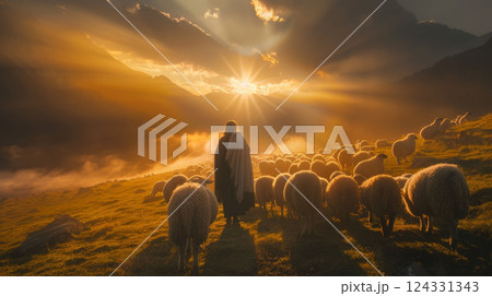 A serene scene of Jesus Christ among a flock of sheep, representing a parable from the Bible. Ideal for themes of worship, divine love, and religious inspiration. 124331343