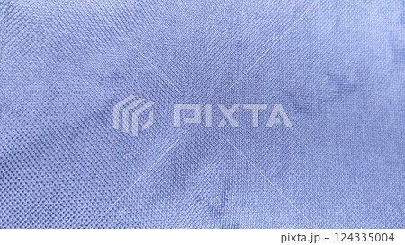 Close-up of textile canvas fabric texture, rough finish, blue color tone for background design. 124335004