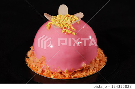 Cake Strawberry with petals on a black background - sweets for children and adults 124335828