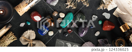 Mystical Flat Lay of Sage, Crystals, and Dried Herbs on Dark Surface banner Mystical Flat Lay of Sage, Crystals, and Dried Herbs on Dark Surface banner 124336025