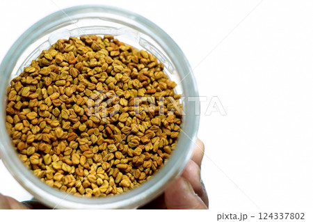 fenugreek seeds or methi dana isolated on white background fenugreek seeds or methi dana isolated on white background 124337802