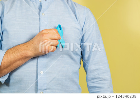 Supporting awareness for prostate cancer with blue ribbon campaign 124340239