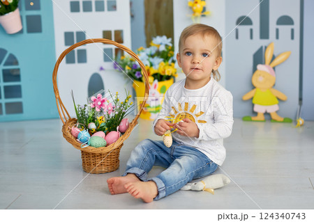 Baby girl celebrate Easter. Baby girl celebrate Easter. 124340743