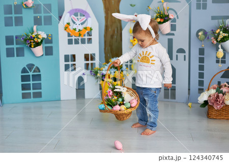 Baby girl celebrate Easter. Baby girl celebrate Easter. 124340745