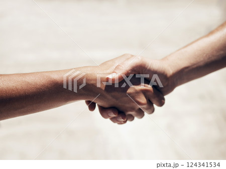 Handshake, agreement or thank you with people welcome, deal or collaboration in teamwork outdoor. Friends or person shake hands together with respect, agree and friendship with zoom in hands in town 124341534