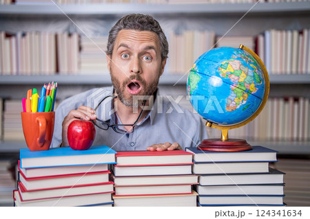teacher in school do homework reading books getting knowledge and education at teachers day 124341634