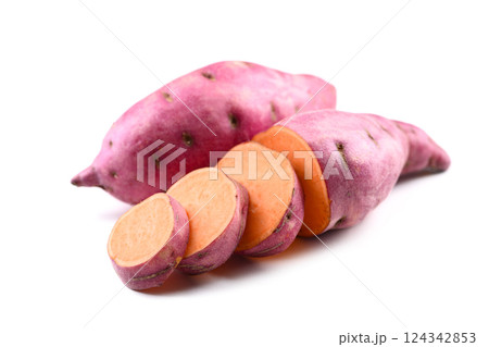 Pink raw sweet potatoes, whole and sliced Pink raw sweet potatoes, whole and sliced 124342853
