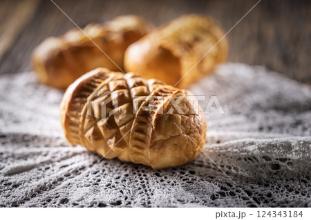Oscypki - Traditional salty smoked cheese made from sheep's milk from the Polish region of Zakopane under the High Tatras Oscypki - Traditional salty smoked cheese made from sheep's milk from the Polish region of Zakopane under the High Tatras 124343184