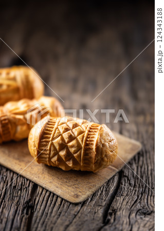 Oscypki - Traditional salty smoked cheese made from sheep's milk from the Polish region of Zakopane under the High Tatras Oscypki - Traditional salty smoked cheese made from sheep's milk from the Polish region of Zakopane under the High Tatras 124343188