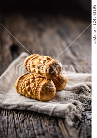 Oscypki - Traditional salty smoked cheese made from sheep's milk from the Polish region of Zakopane under the High Tatras 124343195