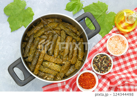 Stuffed collard greens with boiled leaves, traditonal turkish black sea region food, sarma, dolma Stuffed collard greens with boiled leaves, traditonal turkish black sea region food, sarma, dolma 124344498