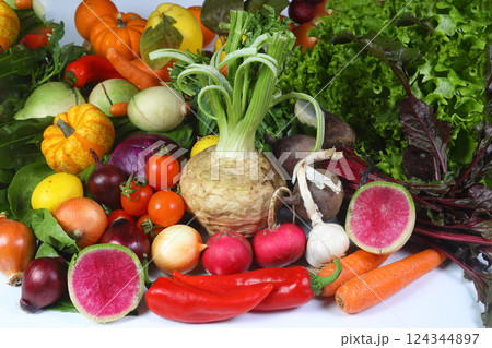 Various raw vegetables are isolated on a white background. Various raw vegetables are isolated on a white background. 124344897