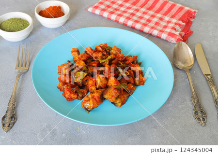 Grilled Turkish eggplants in tomato sauce (soslu patlican or saksuka.). 124345004