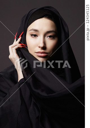 beautiful islamic young woman. beauty girl in hijab beautiful islamic young woman. beauty girl in hijab 124345125