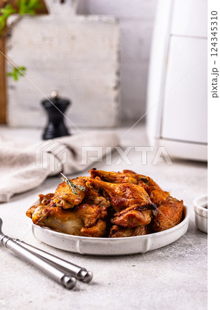 Chicken wings roasted in air fryer Chicken wings roasted in air fryer 124345310